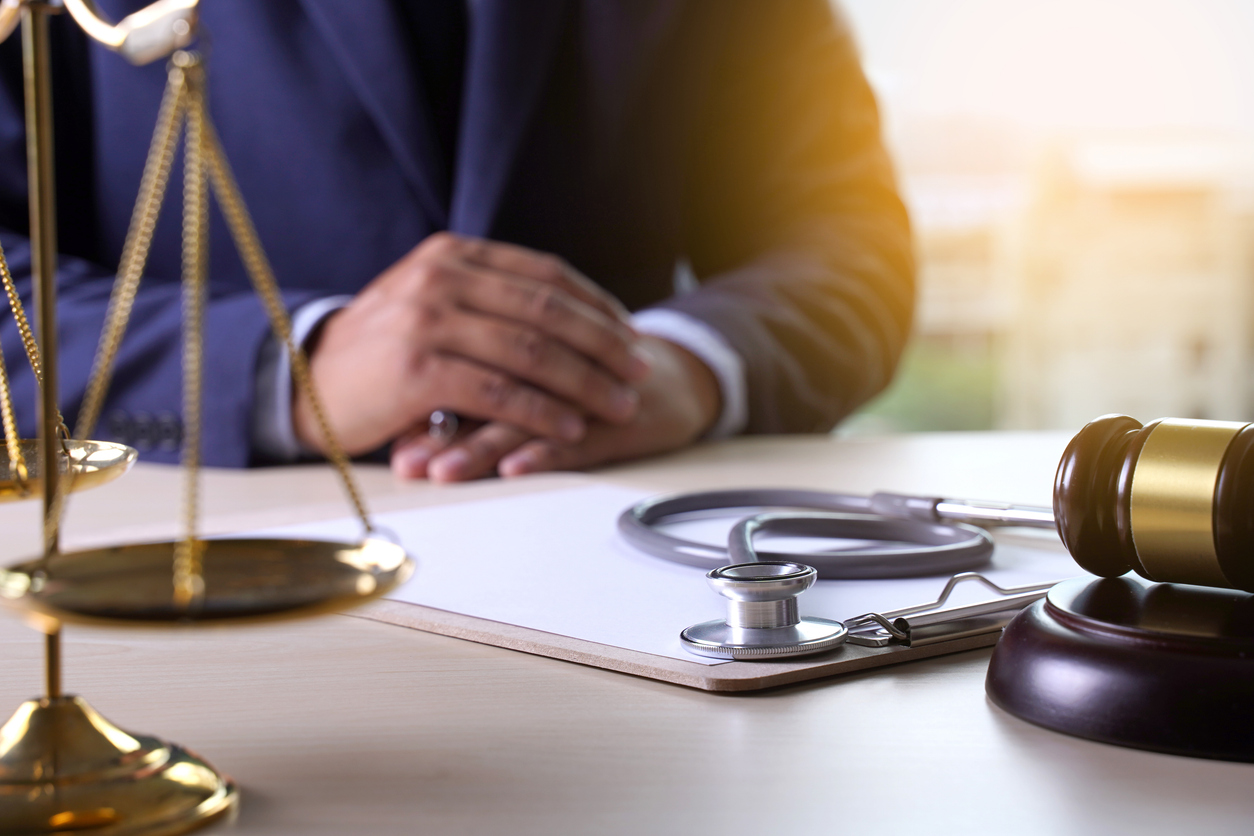 Law gavel stethoscope Health care business rules