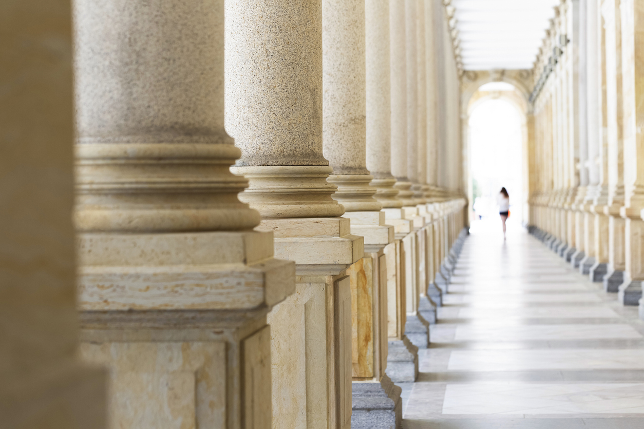 Row of classical columns, Mlynska colonnade Karlovy Vary Czech Republic established 1881, full frame horizontal composition, background with copy space