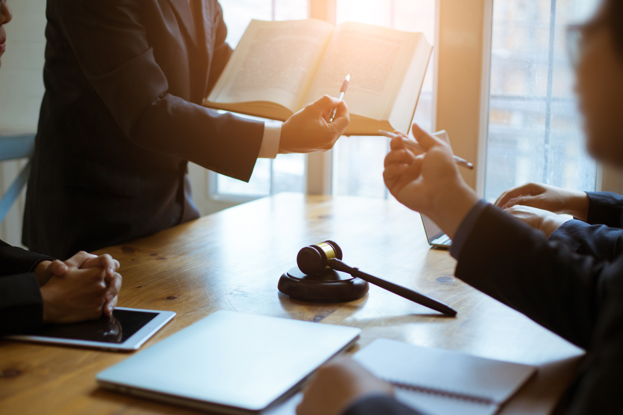 Group of business people and lawyers discussing contract papers ,Consultation between a male lawyer and businessman concept