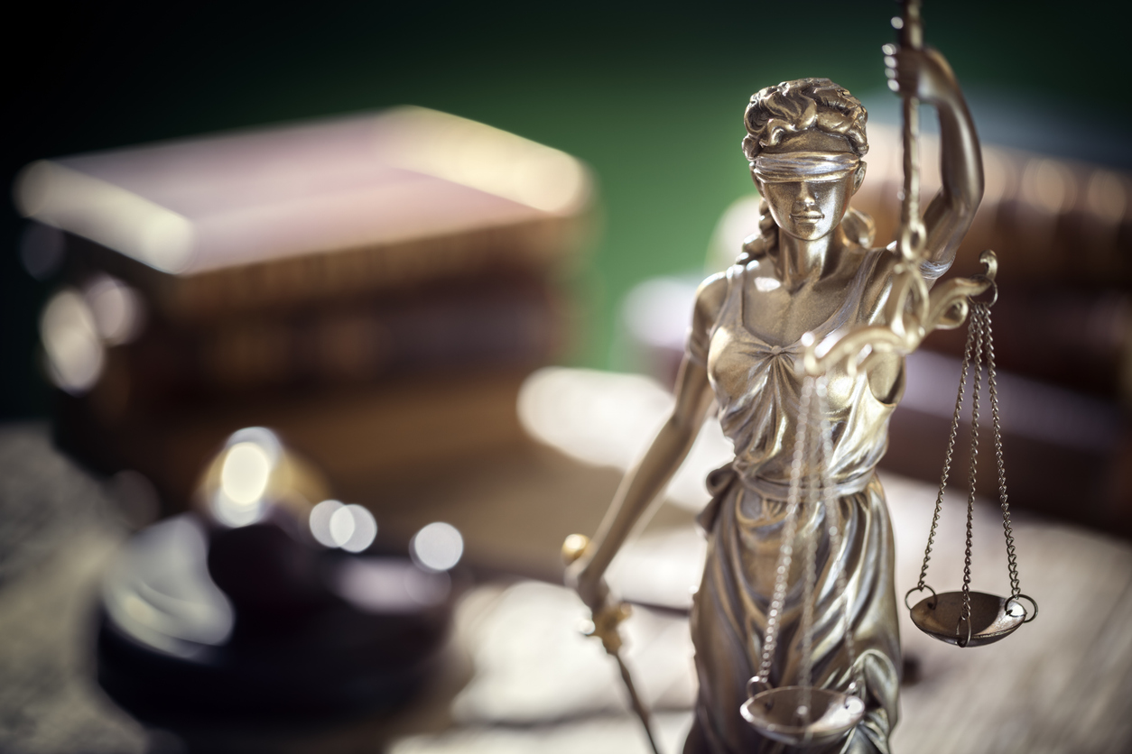 Legal and law concept statue of Lady Justice with scales of justice