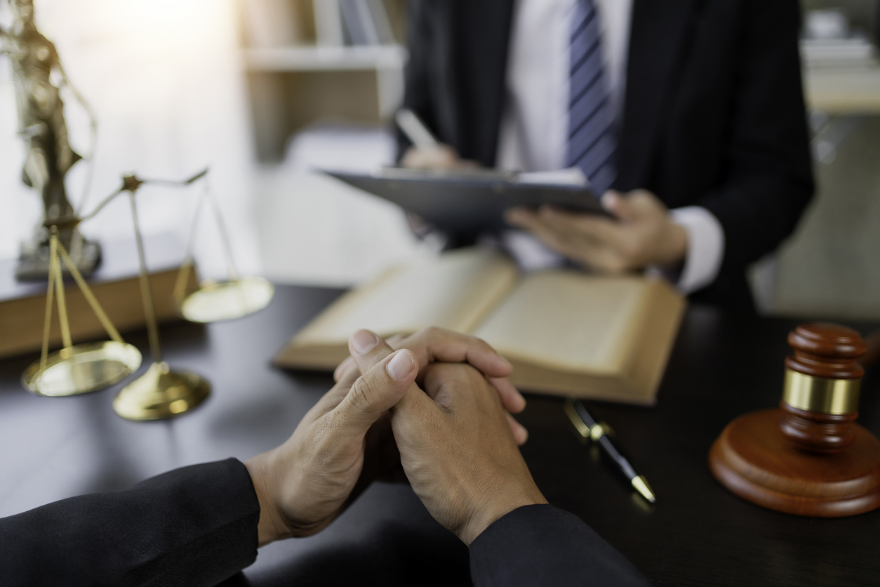 Businessman and lawyer discuss the contract document. Treaty of the law. Sign a contract business.