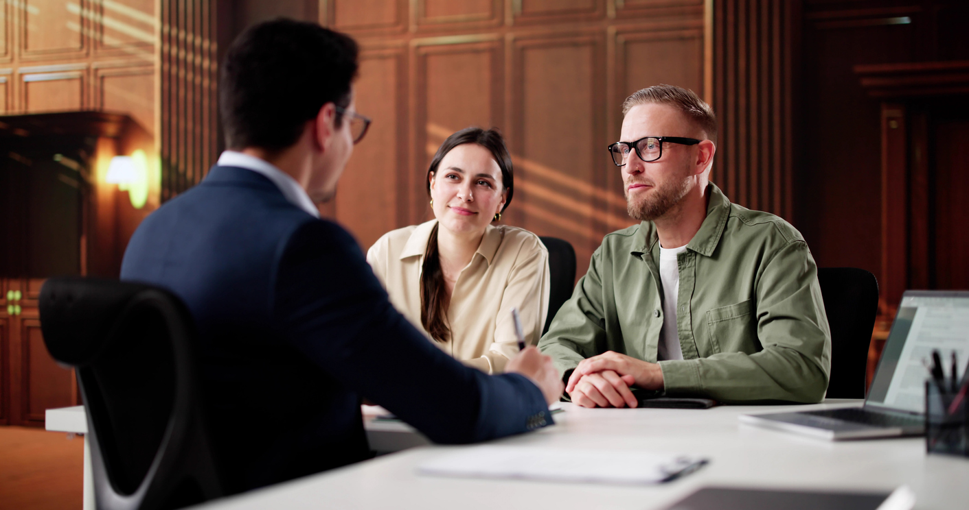 Trusted Family Lawyer Consulting Couple In Court Meeting