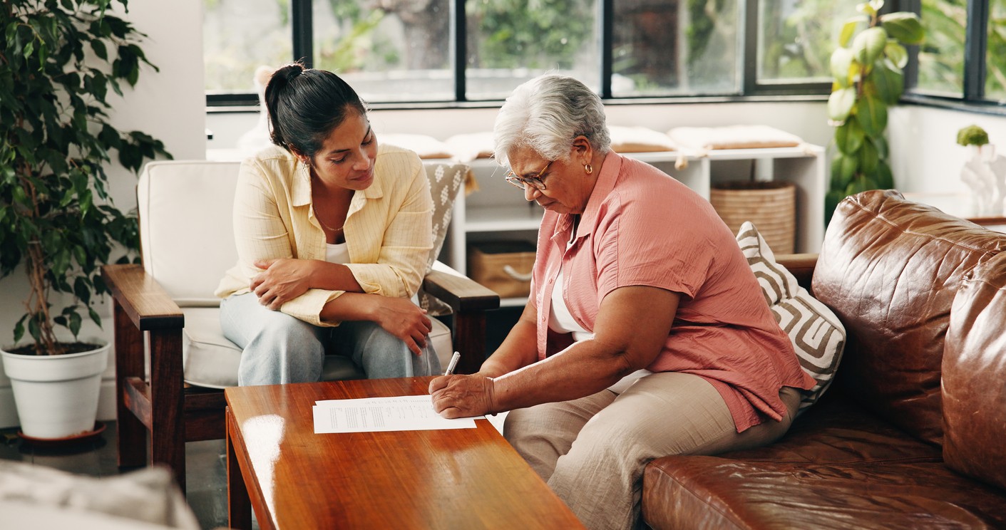 Documents, help or signature with old woman and daughter on sofa in home for insurance or will. Approval, family or paperwork with adult child and senior parent in apartment for retirement planning
