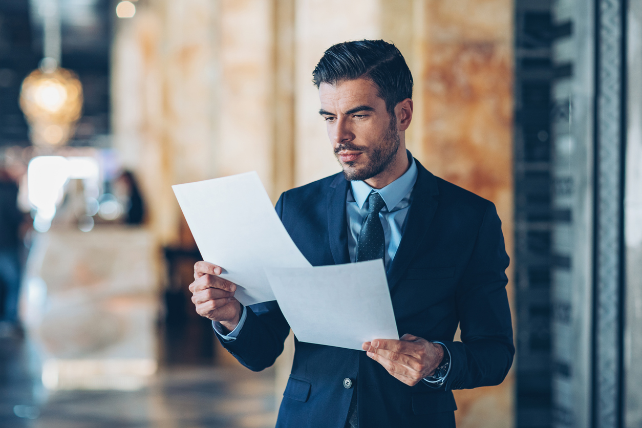 Businessman reading documents